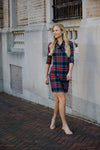 Outdoor model in the Gretchen Scott Ruff Neck Jersey Dress - Duke Of York - Black/Multi