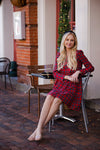 Sitting view of Sail to Sable Highlands Dress - Red Plaid