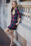 Outdoor model in the Gretchen Scott Ruff Neck Jersey Dress - Duke Of York - Black/Multi