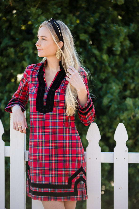 Model outside wearing Sail to Sable Tunic Dress - Red Plaid