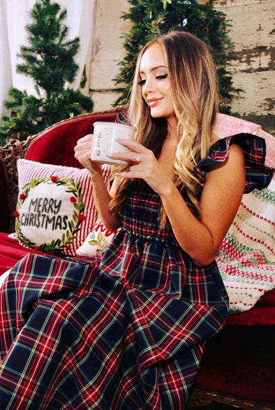 Model sipping coco in The Holly Dress