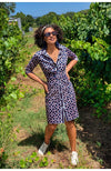 Outdoor model in the Gretchen Scott Twist and Shout Dress - Lucy In The Sky - Navy