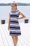 Front view of model in Duffield Lane Hackley Dress - Navy/White Stripe