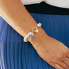Model in the Susan Shaw Blue & White Pearl Toggle Bracelet